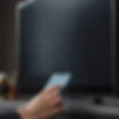 Close-up of a Samsung TV screen being cleaned