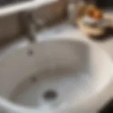 Clogged sink with water overflowing