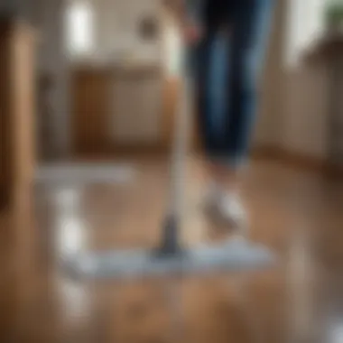 Person using a microfiber mop on laminate flooring