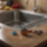 Tools for unclogging a garbage disposal